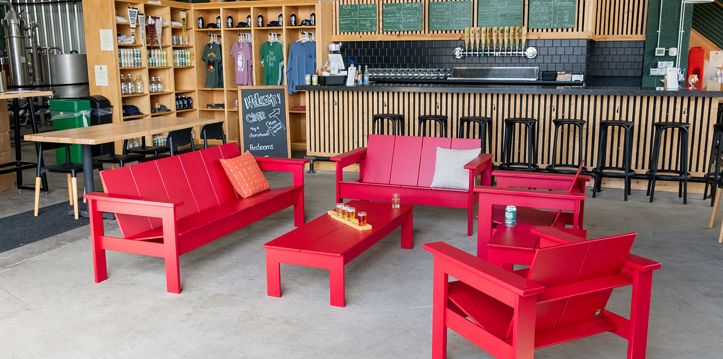 Lounge seating around a cocktail table in a cider brewery